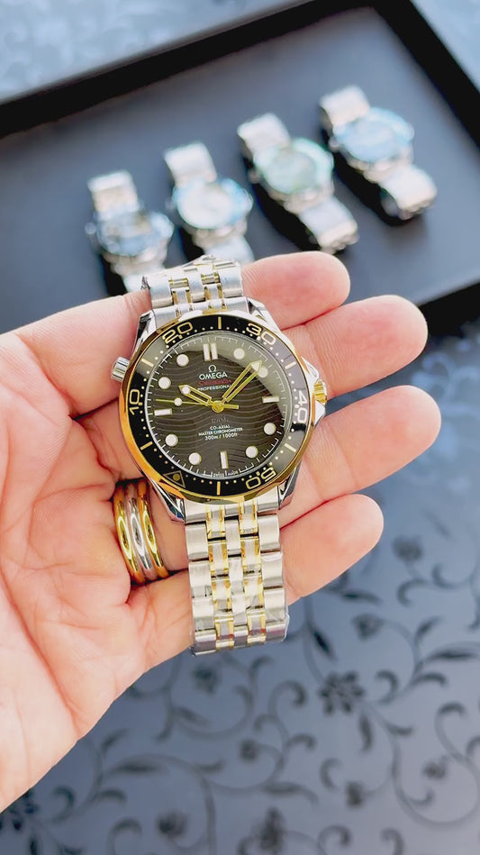 OMEG4_AUTO_GOLD_TT_BLACK